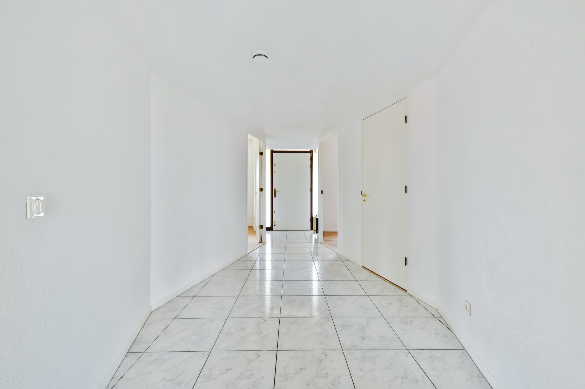 Bright hallway with tiled floor